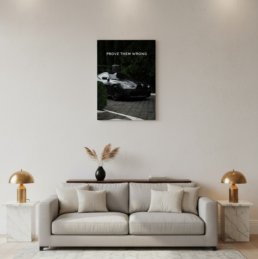 Modern living room with a gray sofa, decorative pillows, and a wall-mounted artwork.