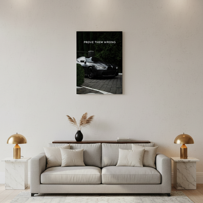 Modern living room with a gray sofa, decorative pillows, and a wall-mounted artwork.
